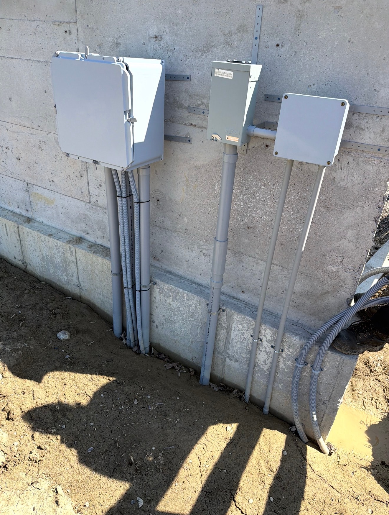 Telecom conduit and junction boxes on site