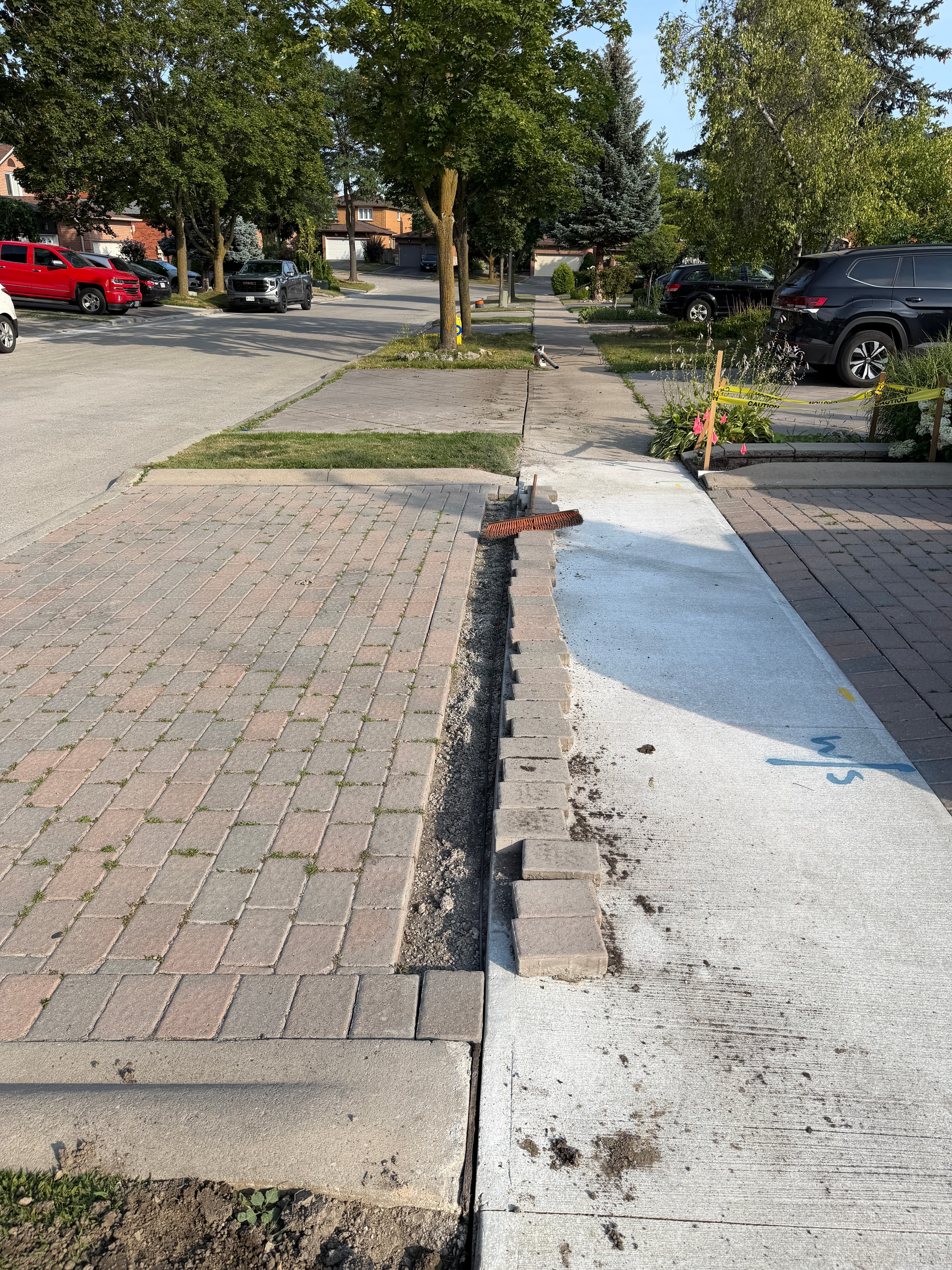 Soil excavation and restoration work on sidewalk